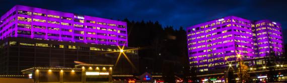 T-Mobile Headquarters in Bellevue, WA, covered in purple light.