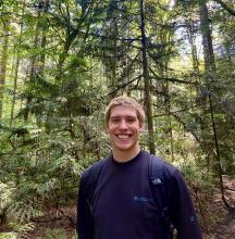 Portrait photo of Maro Denton in a forest